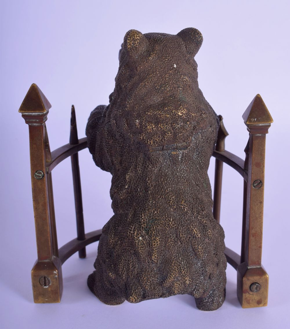 A RARE EARLY 20TH CENTURY AUSTRIAN BRONZE INKWELL modelled as a bear upon a fence. 13 cm x 8 cm. - Image 2 of 4