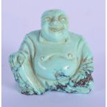 AN EARLY 20TH CENTURY CHINESE CARVED TURQUOISE SCHOLARS FIGURE OF A BUDDHA Late Qing/Republic. 3.5 c