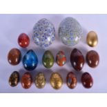 A COLLECTION OF VINTAGE INDIAN PERSIAN LACQUERED EGGS together with a Murano egg etc. Largest 12 cm