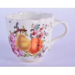 AN 18TH CENTURY GERMAN PORCELAIN RIBBED COFFEE CUP painted with fruiting pods. 6 cm wide.