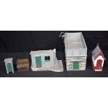 A collection of metal and wood model buildings probably for a train set 17 x 27cm (5)