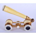 A LOVELY PAIR OF EARLY 20TH CENTURY MAPPIN & WEBB FRENCH ENAMELLED OPERA GLASSES. 20 cm long extende