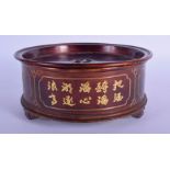 AN UNUSUAL EARLY 20TH CENTURY CHINESE LACQUERED PEWTER CENSER AND COVER decorated with calligraphy.