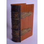 A RARE EARLY 20TH CENTURY CATALIN BAKELITE IMITATION BOOK STORAGE BOX. 15 cm x 10 cm.