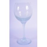 A VENETIAN WHITE SWIRLING ENAMELLED WINE GLASS. 19 cm high.