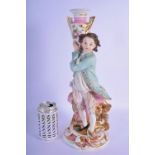 A LARGE 19TH CENTURY FRENCH FRANCO RUSSIAN PORCELAIN FIGURE OF A BOY modelled holding aloft a vase.
