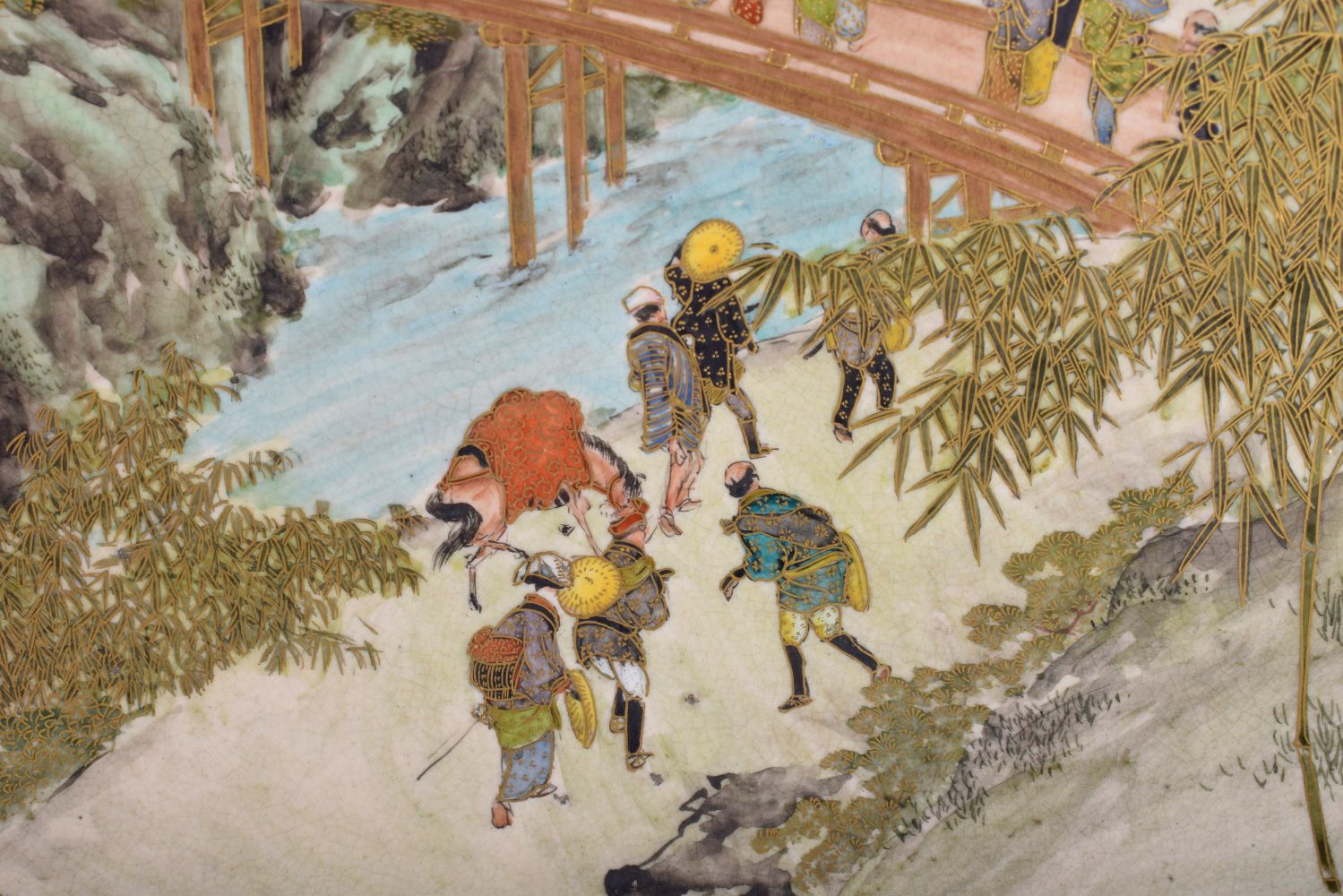 A LATE 19TH CENTURY JAPANESE MEIJI PERIOD SATSUMA DISH painted figures on a bridge within a landscap - Bild 4 aus 6