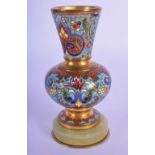 A SMALL 19TH CENTURY FRENCH CHAMPLEVE ENAMEL AND BRONZE VASE upon an onyx base, decorated with flowe