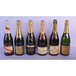 THREE BOTTLES OF MOET ET CHANDON CHAMPAGNE together with three others. (6)