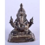 A 19TH CENTURY INDIAN SILVER FIGURE OF GANESHA modelled upon a rectangular plinth. 43 grams. 5.5 cm