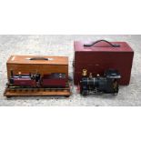 Two boxed metal steam Locomotives one with a tender . 17 x 42cm. (3)