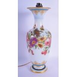 AN ANTIQUE FRENCH ENAMELLED GLASS VASE converted to a lamp, painted with foliage. Glass 35 cm high.