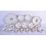 A GERMAN DRESDEN PORCELAIN TEA SET painted with flowers upon a moulded border. Largest 22 cm wide. (