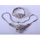 A FINE 18CT WHITE GOLD AND DIAMOND NECKLACE with matching bracelet. 91 grams. Chain 44 cm long, brac