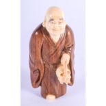 JAPANESE WOOD AND BONE NETSUKE. 5.5cm x 3cm