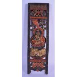 A RARE 18TH CENTURY JAPANESE EDO PERIOD CARVED AND LACQUERED PANEL depicting a Buddhistic figure upo