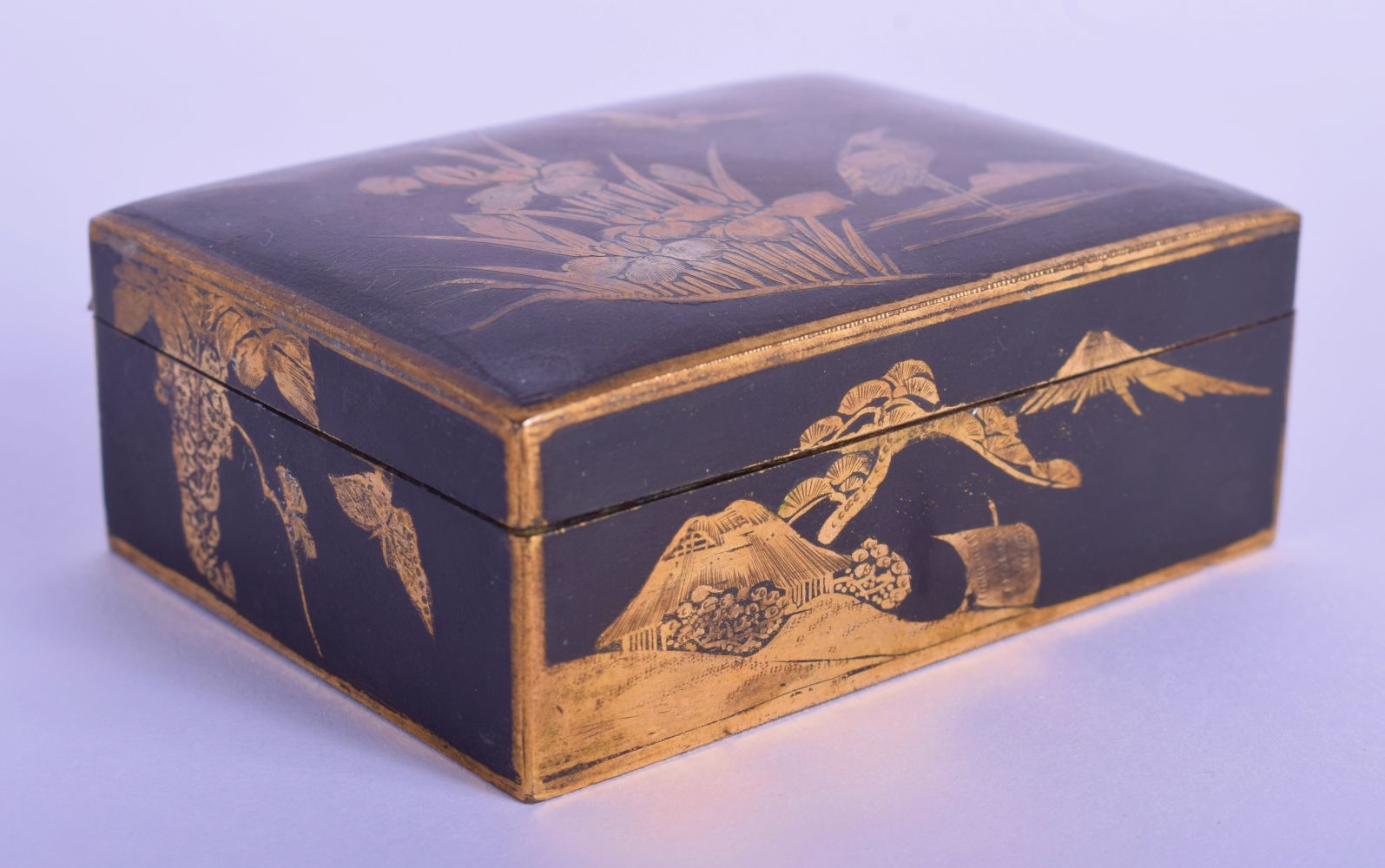A LATE 19TH CENTURY JAPANESE MEIJI PERIOD KOMAI STYLE MIXED METAL BOX decorated with a figure perche