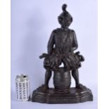 AN UNUSUAL ANTIQUE DON'T YOU TELL CAST IRON OLD TOM DOOR STOP. 42 cm x 24 cm.