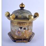 A 19TH CENTURY JAPANESE MEIJI PERIOD SATSUMA CENSER AND COVER painted with figures and landscapes. 1