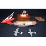 A collection of vintage model boats and planes together with a box of vintage fishing lures (QTY).