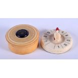 TWO ANTIQUE IVORY GAMING COUNTER and a box. 4 cm diameter.