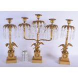 A SET OF THREE 19TH CENTURY FRENCH ORMOLU CRYSTAL DROP CANDLESTICKS with bird supports. Largest 42 c