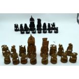 A cased finely carved wooden Indian chess set. King 13cm (31)