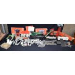 A collection of American Lionel model trains , station and 027 track. (QTY).