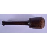 A LARGE 18TH/19TH CENTURY TREEN CARVED WOOD PESTLE. 27 cm long.