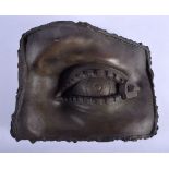 A CONTEMPORARY BRONZE STUDY OF AN EYE. 20 cm x 22 cm.