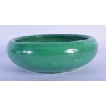 A CHINESE QING DYNASTY MONOCHROME GREEN GLAZED BRUSH WASHER CENSER of plain form. 15 cm wide.