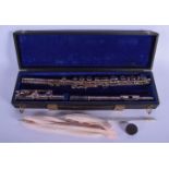 A BOXED ROMILLY GRADUATE FLUTE Rudall, Carte & Co of London. 63 cm long.