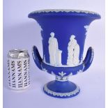 A LARGE WEDGWOOD BLUE BASALT TWIN HANDLED PORCELAIN VASE decorated with classical figures and fleur