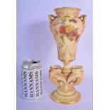 A LATE 19TH CENTURY ROYAL WORCESTER BLUSH IVORY TWIN HANDLED VASE painted with floral sprays. 27 cm