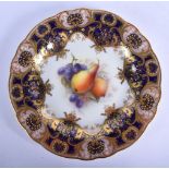 Royal Worcester plate finely painted with fruit under a blue and raided gilt border by R. Sebright,