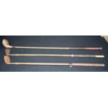 Three antique hickory shafted golf clubs 108cm (3).