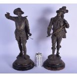 A LARGE PAIR OF 19TH CENTURY SPELTER FIGURES OF CAVALIERS modelled upon black painted bases. 51 cm h