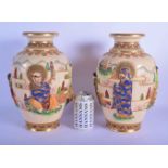 A LARGE PAIR OF EARLY 20TH CENTURY JAPANESE MEIJI PERIOD SATSUMA VASES decorated in figures within a