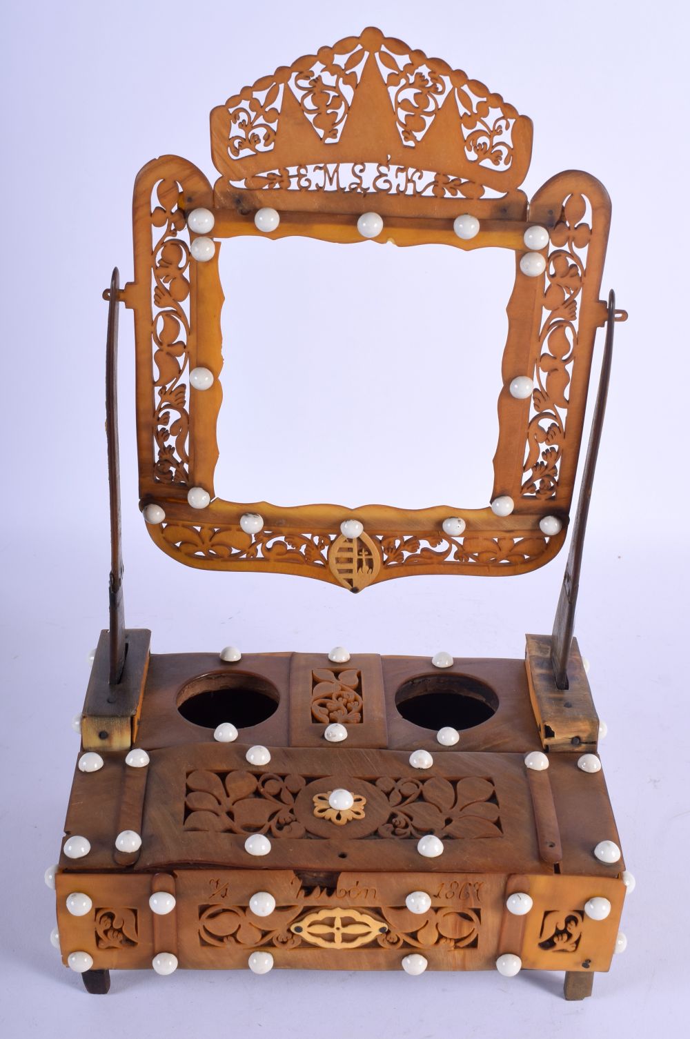 AN ANTIQUE ANGLO INDIAN CARVED HORN FRAME. 26 cm x 16 cm.