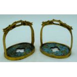 A pair of bronze Cloisonne enamelled stirrups. 13cm X 13cm (2).