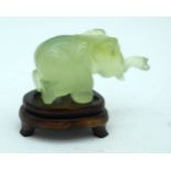 A small Indian jade elephant on a stand. Height 6cm