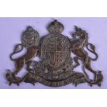 AN ANTIQUE ARMORIAL BRASS PLAQUE. 13 cm x 9 cm.