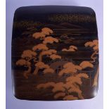 A 19TH CENTURY JAPANESE MEIJI PERIOD BLACK LACQUER BOX AND COVER decorated with trees, a bridge and