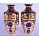 A PAIR OF ROYAL CROWN DERBY IMARI VASES. 16 cm high.