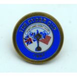 A 1947 enamelled Ryder cup Golf ball marker. 2cm.