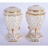 Graingers Worcester fine pair of reticulated pot pourri vases and cover highlighted with gilding, pa