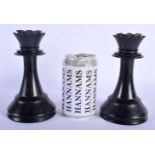 A RARE LARGE PAIR OF ANTIQUE CARVED EBONY CHESS PIECES possibly Jacques. 16 cm high.