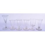 SIX GEORGE III GLASSES in various forms and sizes. Largest 16.5 cm high. (6)