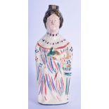 A RARE 18TH/19TH CENTURY STAFFORDSHIRE POTTERY DECANTER modelled as a female wearing splash decorate