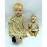 A large Vintage doll together with a smaller doll 63cm. (2).